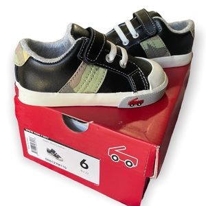 See Kai Run camo and black leather lucci pull on sneakers